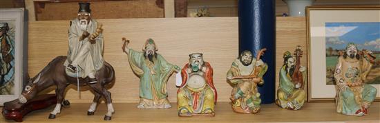 Large Chiwan pottery group and 5 porcelain figures of immortals